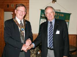 Peter Roswell receiving his President's Collar from outgoing President Ivor Metherell